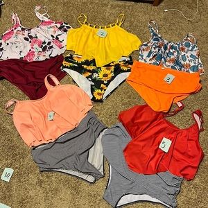 Size 3xl two piece (high waist and flowy top). Fits extra large.